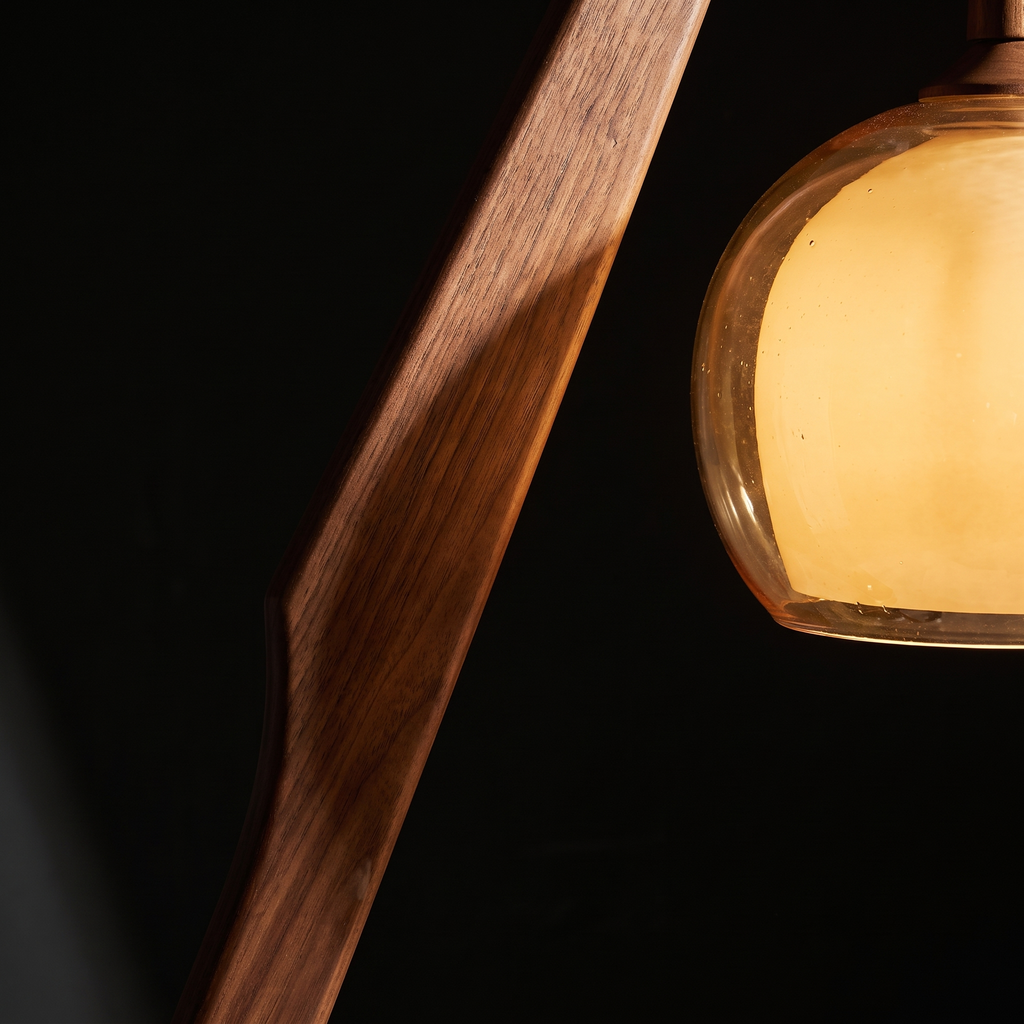 Meridian floor lamp, detail close-up of walnut body and glass shade
